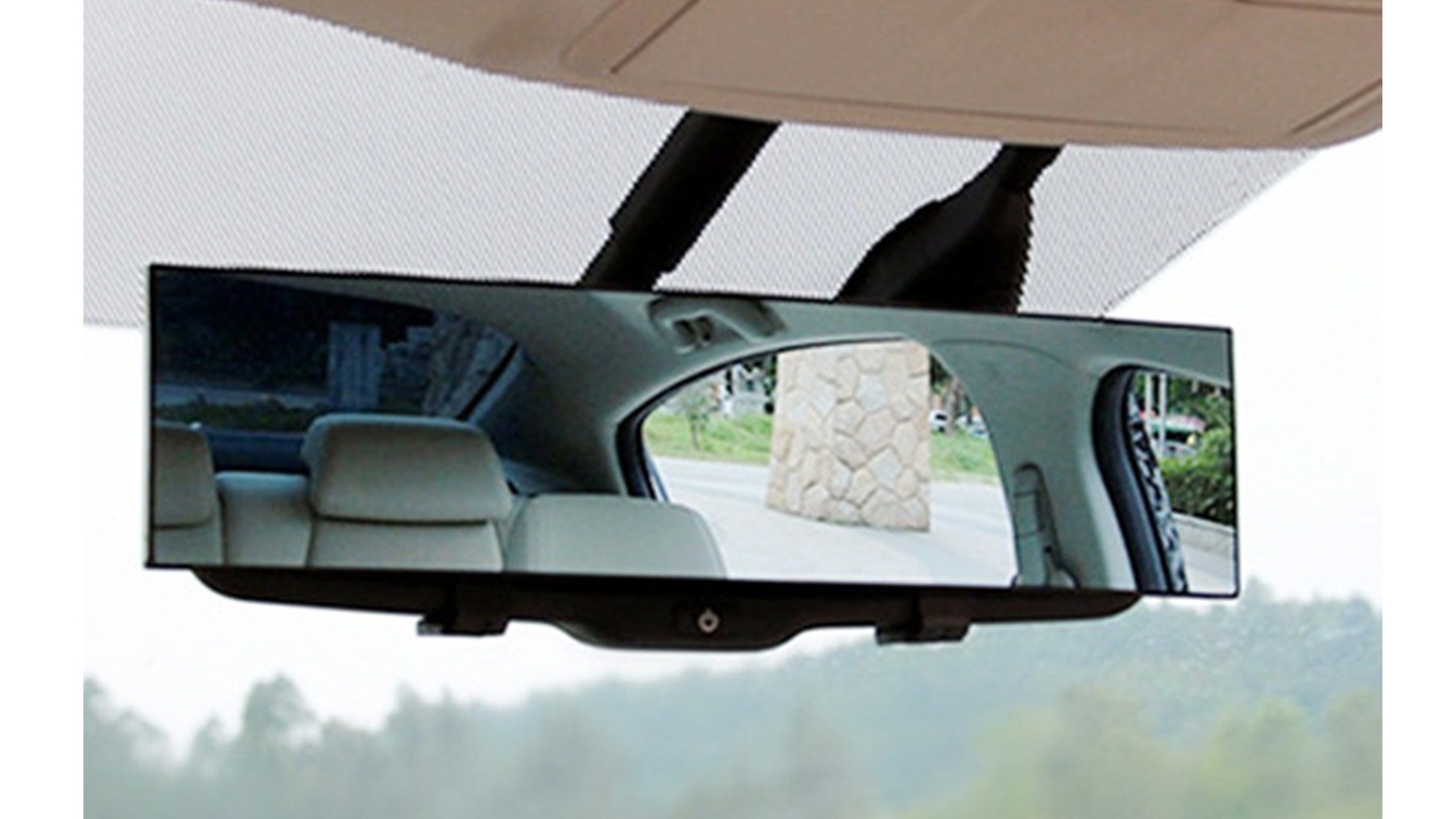 What is a panoramic mirror and how can it help you avoid blind spots?